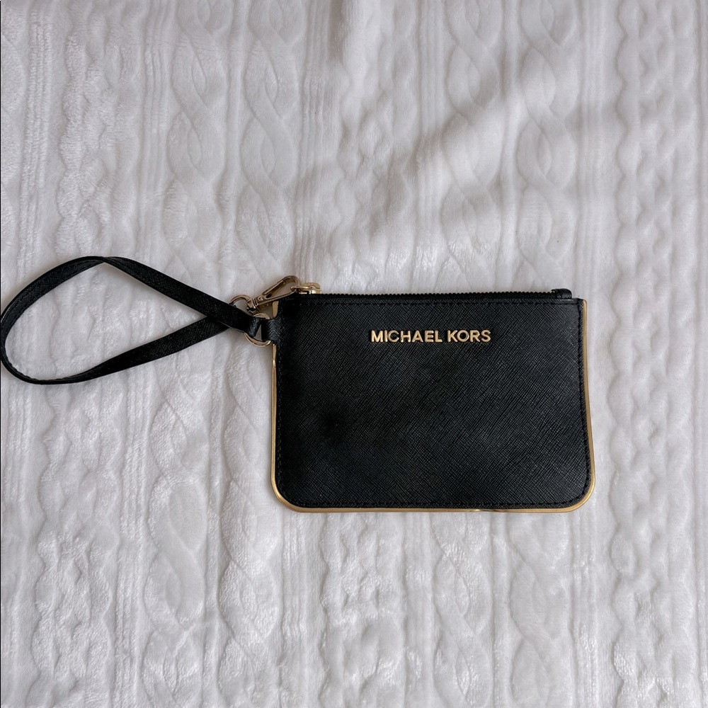 Michael Kors Black leather wristlet with gold trim